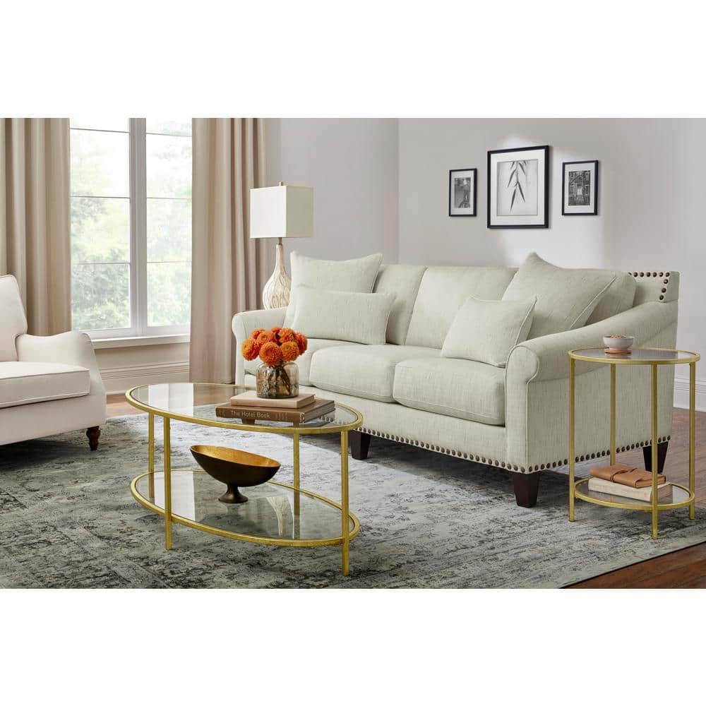 Bella 46 In. Gold Leaf/Clear Large Oval Glass Coffee Table with Shelf