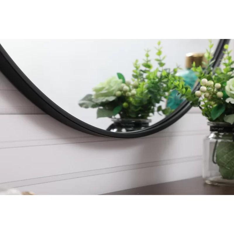 Cassie round Metal Wall Mirror