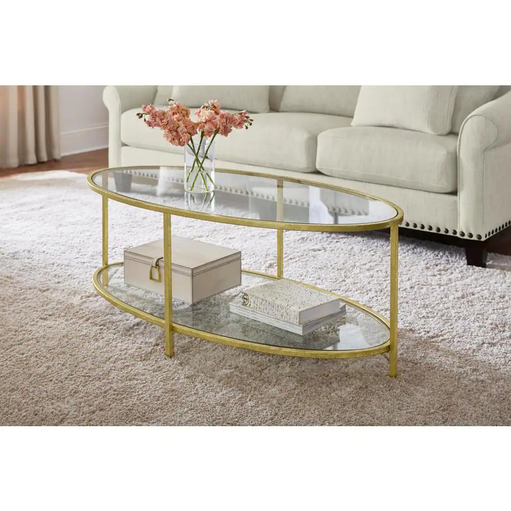 Bella 46 In. Gold Leaf/Clear Large Oval Glass Coffee Table with Shelf