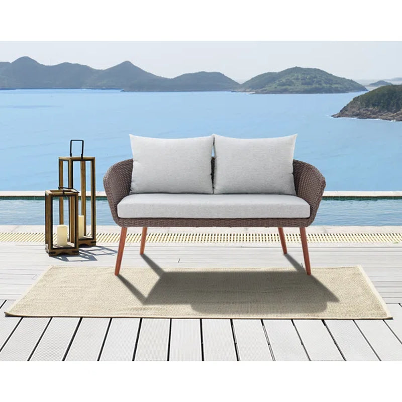 Panek 57'' Wide Outdoor Wicker Loveseat with Cushions